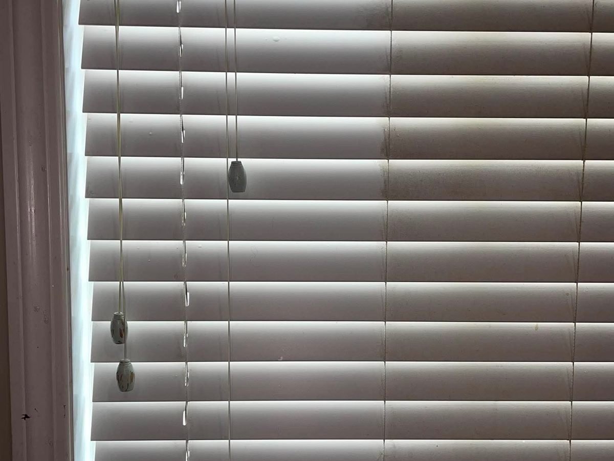 Window blinds with light coming through